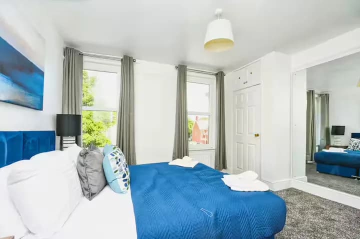 Bedroom with blue bedding