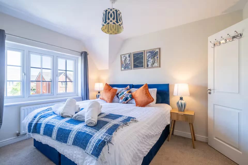 Bedroom with blue bedding