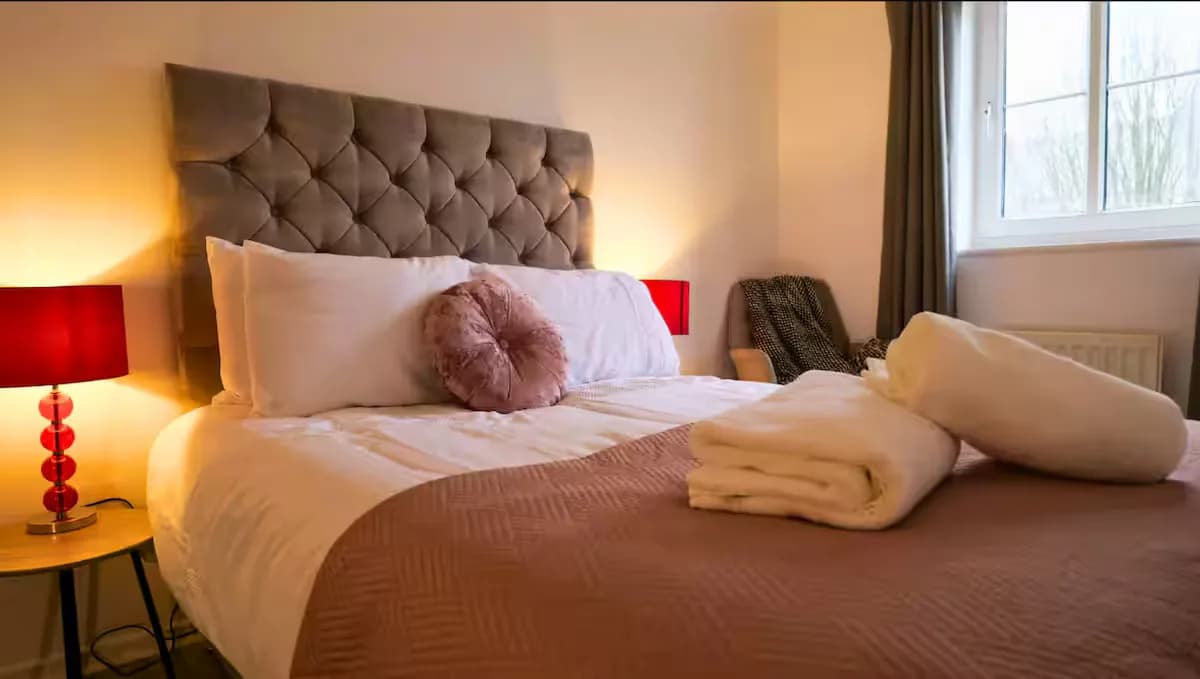 Bedroom with upholstered headboard