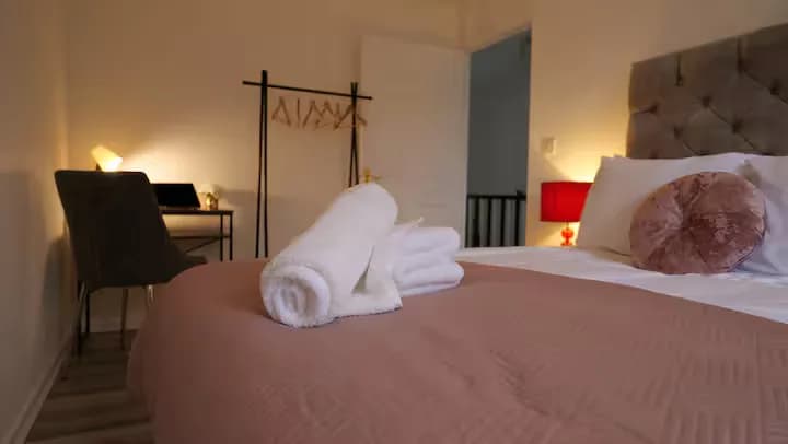 Bedroom with upholstered headboard